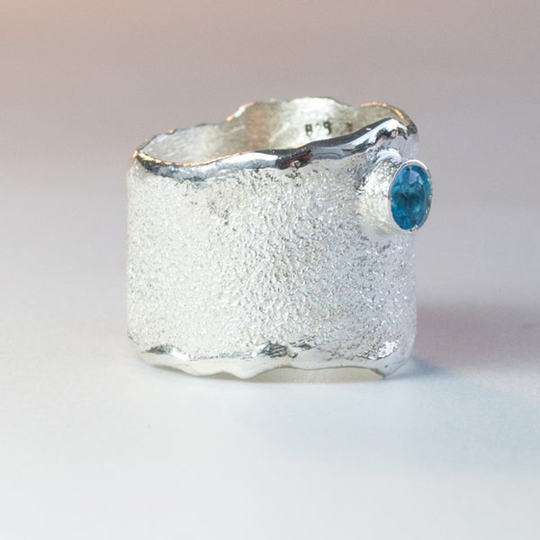 wide silver ring with blue gemstone, blue topaz ring 