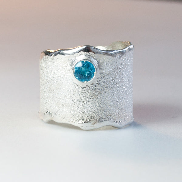 wide silver ring with blue gemstone, blue topaz ring 