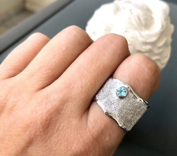 wide silver ring with blue gemstone, blue topaz ring 