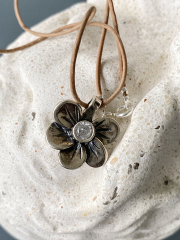 silver flower necklace with gemstone 