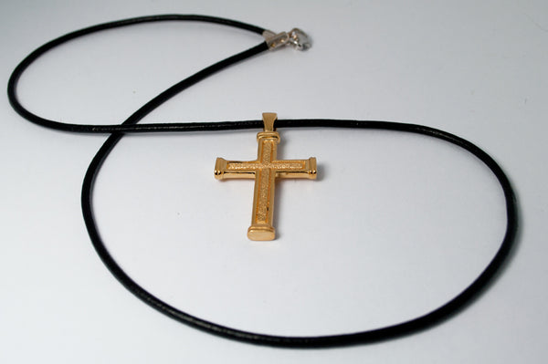 Men's gold cross necklace with leather cord 