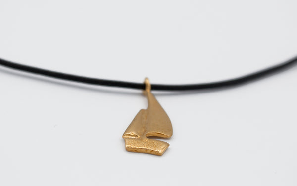 gold sailboat pendant, sailboat charm, sterling silver charm with  leather cord 