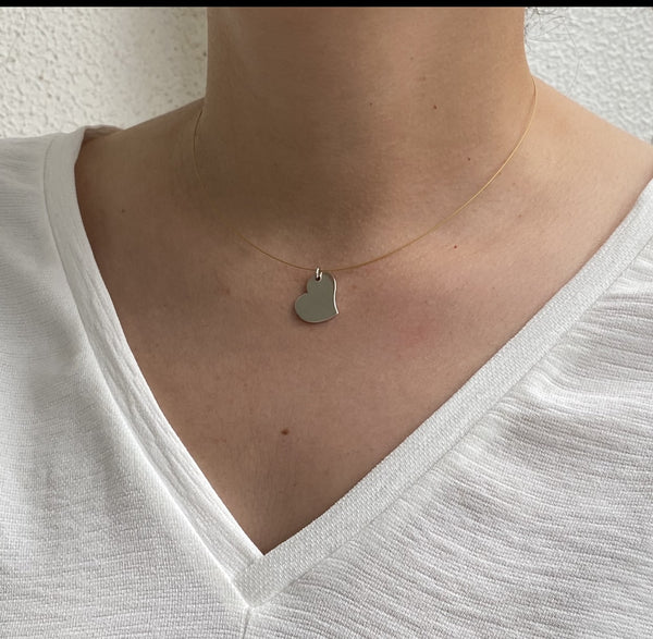 silver heart necklace on a wire 