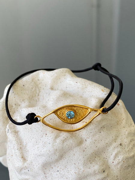 Evil eye bracelet gold, blue topaz gemstone black nylon cord 