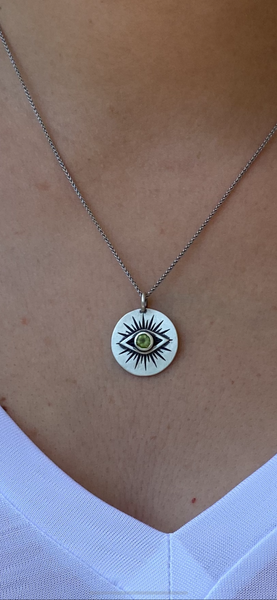 Evil eye necklace silver with a green gemstone 