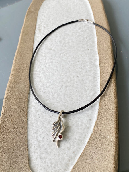 Angel wing necklace with red garnet gemstone 