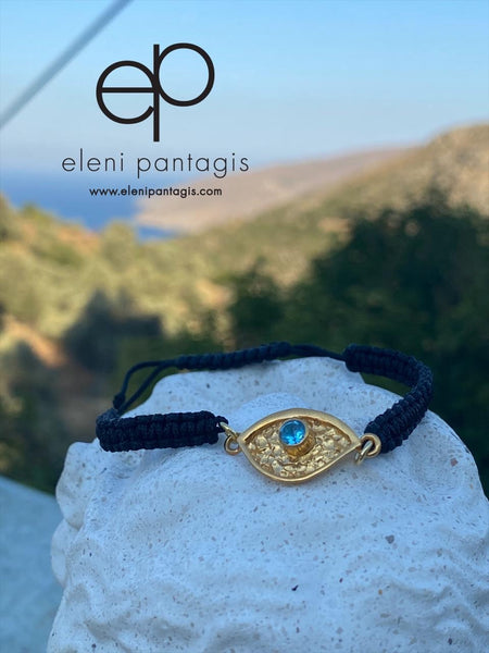 evil eye bracelet gold with blue gemstone