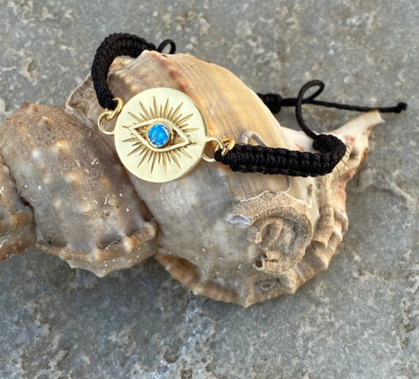 Evil eye bracelet gold with blue gem,  macrame