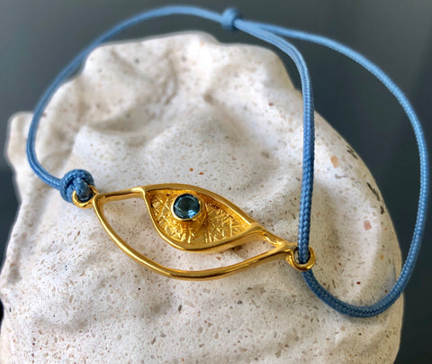 Evil eye bracelet gold, blue topaz gemstone blue nylon cord 