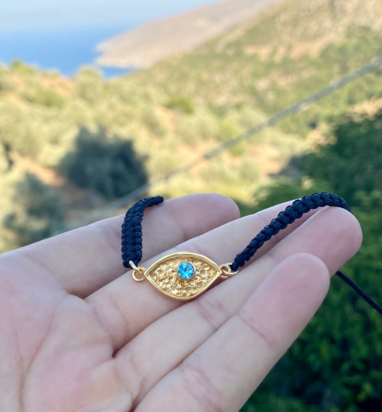 evil eye bracelet gold with blue gemstone