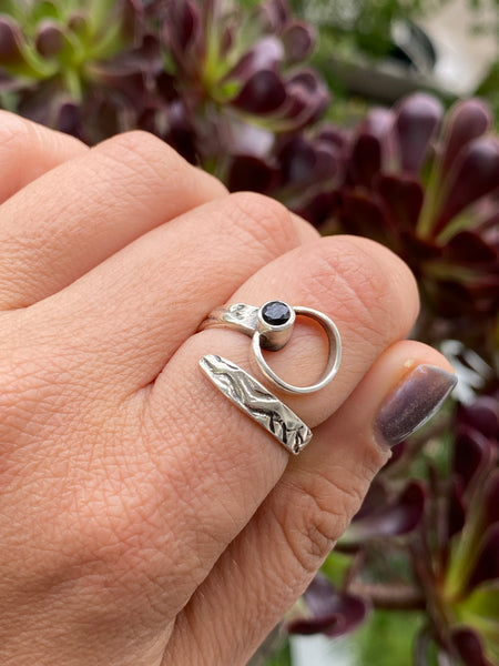 handmade silver ring with black gemstone