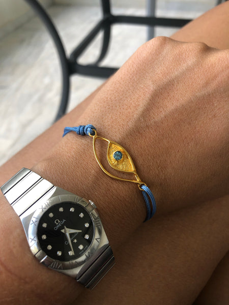 Evil eye bracelet gold, blue topaz gemstone blue nylon cord 