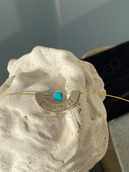 Greek key necklace with turquoise on a stainless steel wire