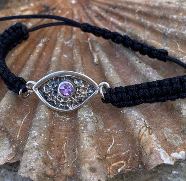 Evil eye bracelet with a purple gemstone, amethyst eye bracelet