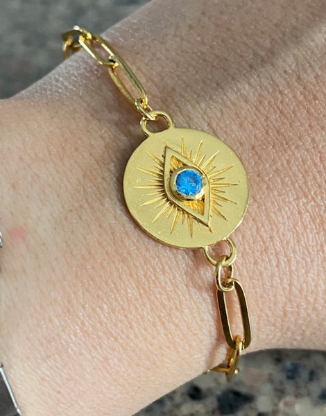 Evil eye bracelet gold with blue gem paperclip chain