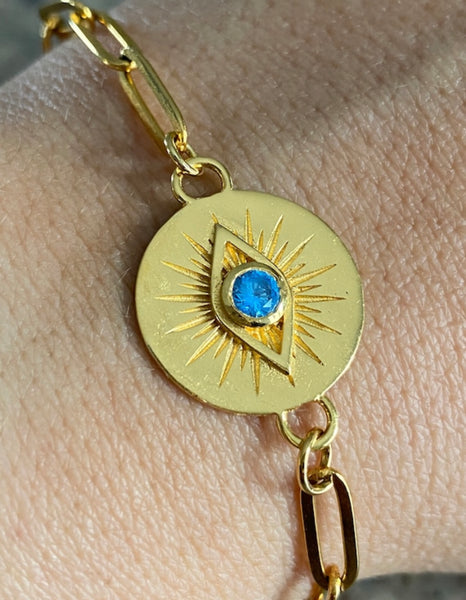 Evil eye bracelet gold with blue gem paperclip chain