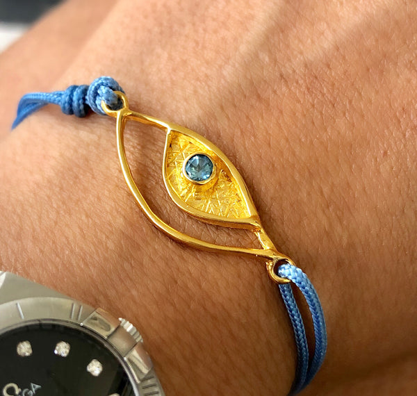 Evil eye bracelet gold, blue topaz gemstone blue nylon cord 