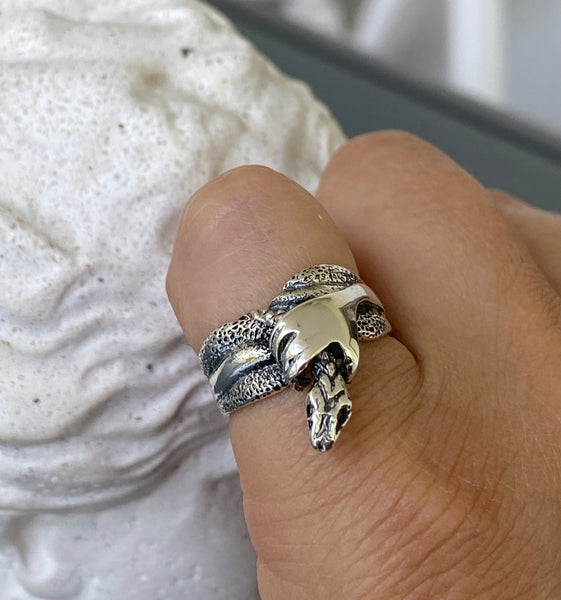 snake ring, silver snake ring, hand holding snake ring 
