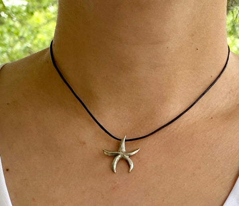 Starfish pendant sterling silver with blue cord 