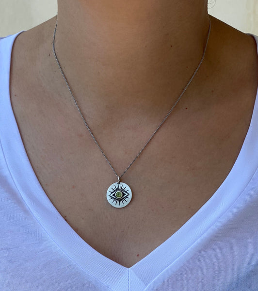 Evil eye necklace silver with a green gemstone 