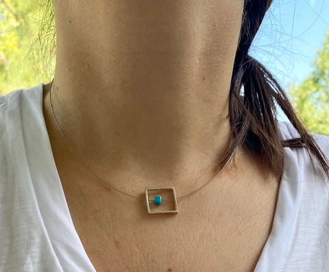 Silver square necklace with turquoise on a stainless steel wire