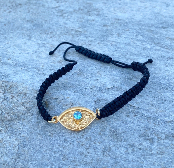 evil eye bracelet gold with blue gemstone