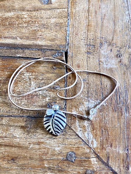silver leaf necklace with gemstone 