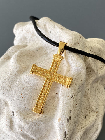 Men's gold cross necklace with leather cord 