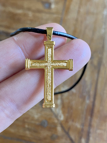 Men's gold cross necklace with leather cord 