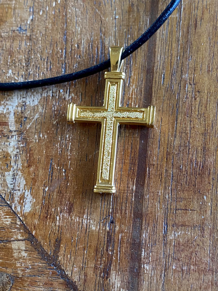 Men's gold cross necklace with leather cord 