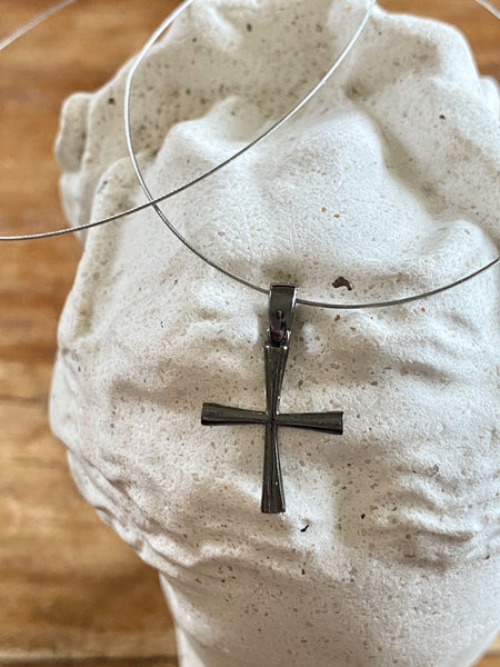 small black cross, woman’s silver cross 